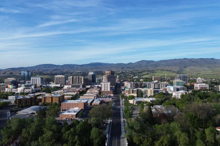 Boise Idaho downtown skyline with mountains — painting contractor serving Boise by Simon's Painting