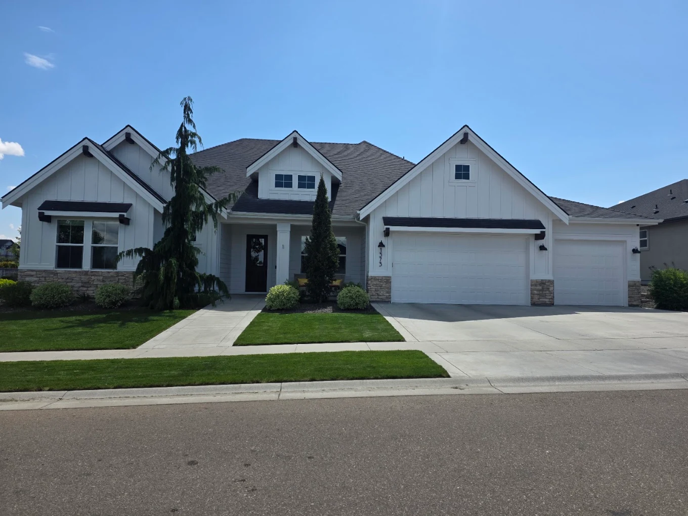 Modern farmhouse exterior painting project in Meridian, Idaho