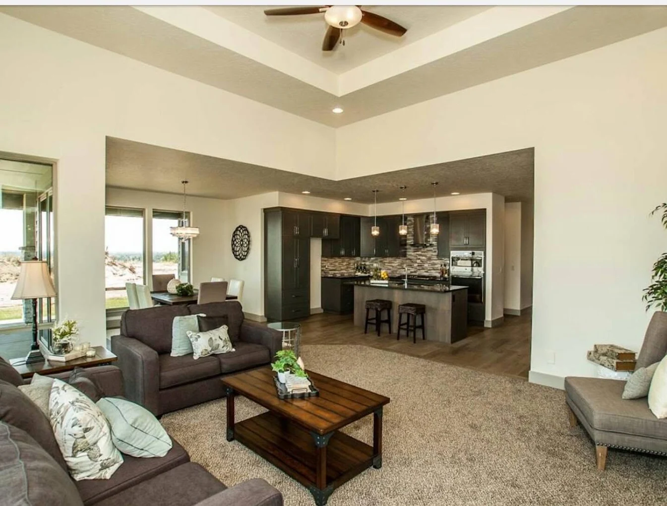 Interior painting of an open-concept living and kitchen area in the Treasure Valley