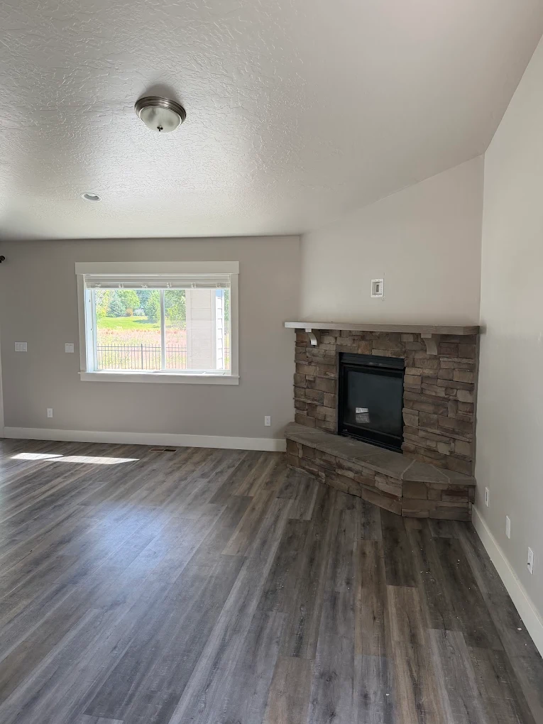 Interior room painting with fireplace surround detail in Nampa, Idaho