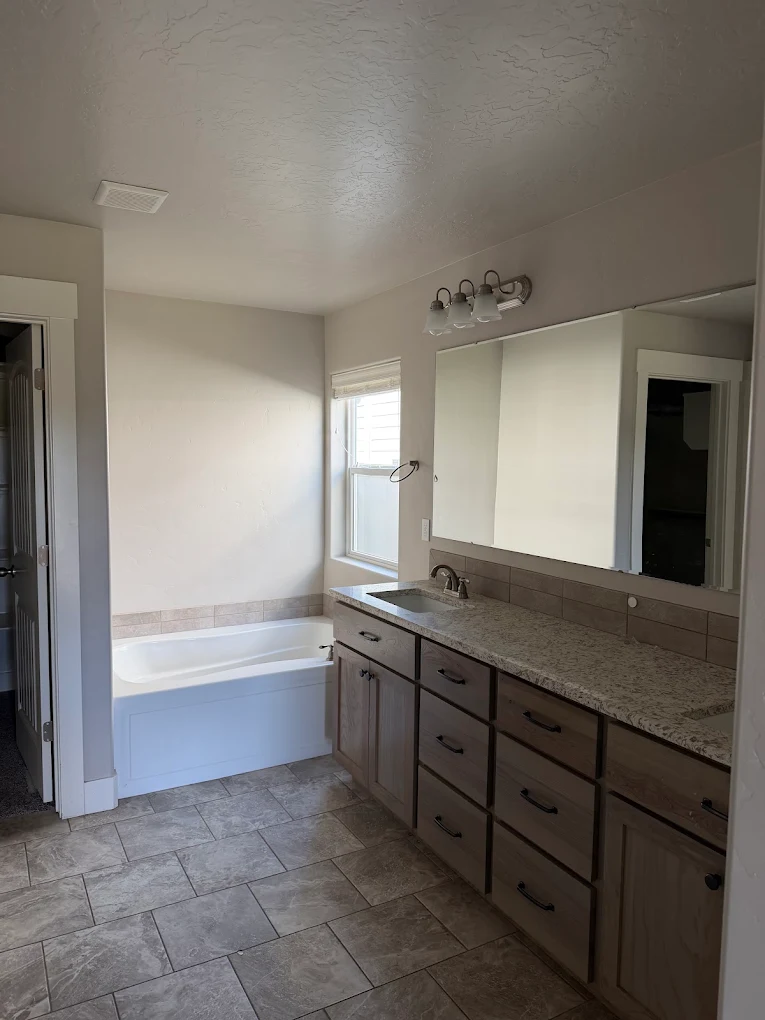 Bathroom painting and cabinet refinishing in an Eagle, Idaho home