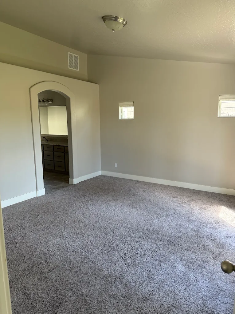 Interior bedroom and en suite painting in a Treasure Valley home