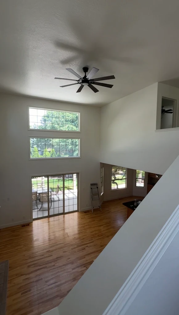 Interior painting of a two-story great room in a Meridian, Idaho home