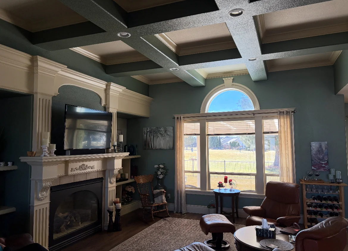 Interior painting of a living room with coffered ceiling detail in Boise